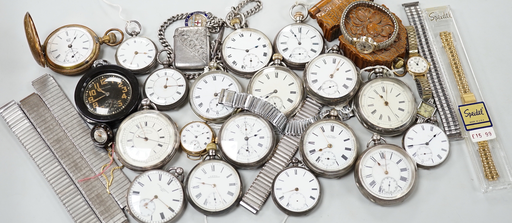 Twenty one assorted silver or base metal pocket watches including Waltham and Child of Birmingham, three wrist watches and a silver vesta case.